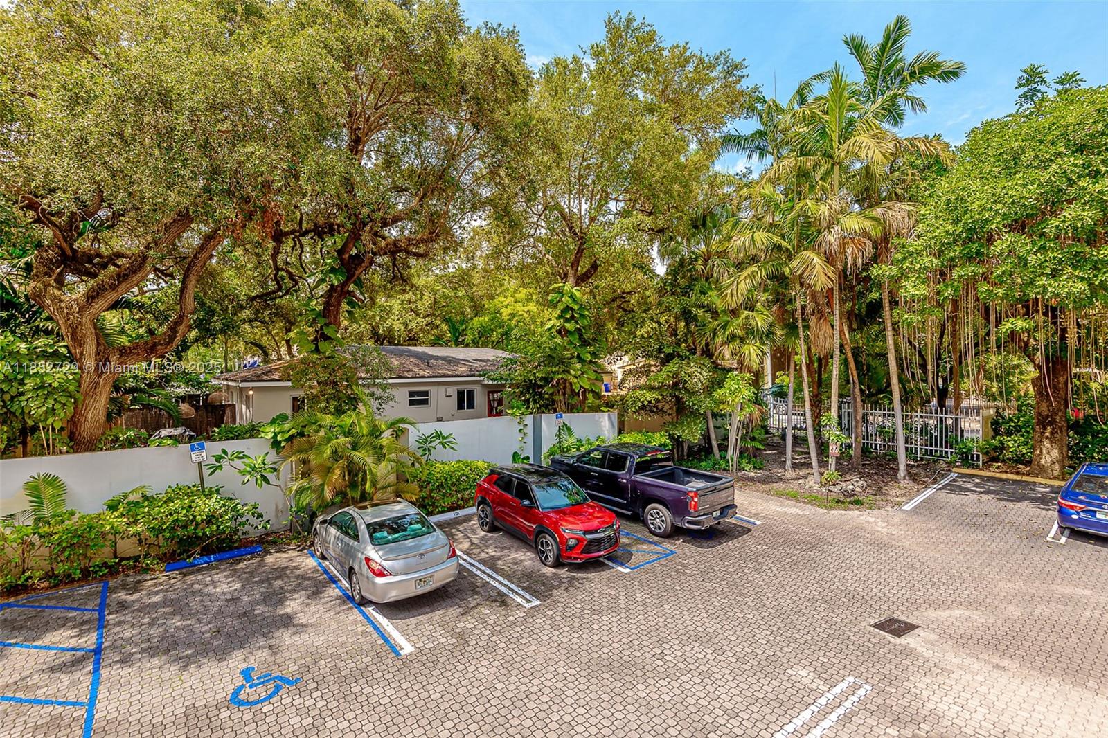 2734 Bird Avenue, Unit 107 Miami, FL 33133 - Photo 14 of 15 a garden view with a seating space