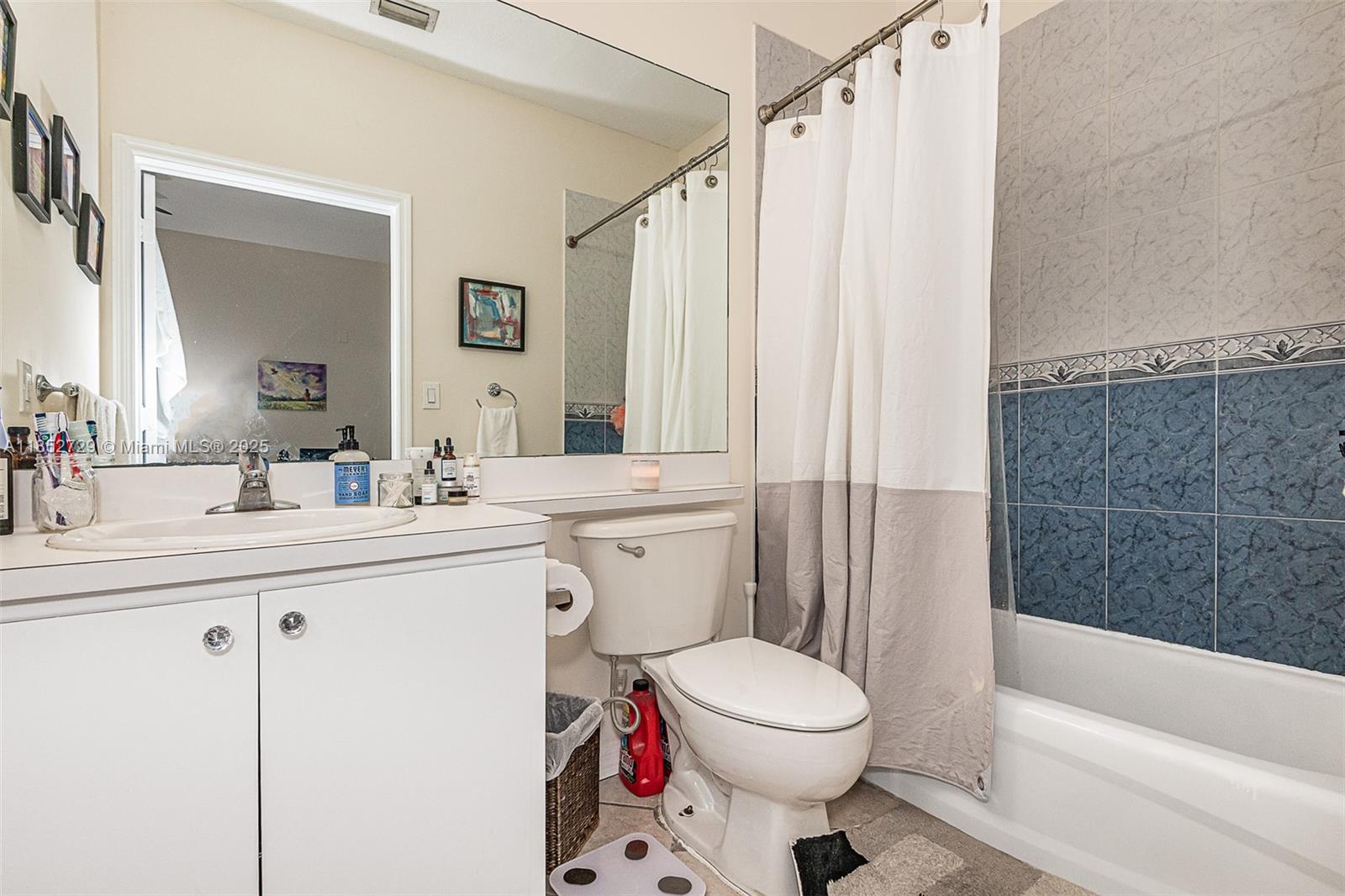 2734 Bird Avenue, Unit 107 Miami, FL 33133 - Photo 10 of 15 a bathroom with a sink toilet and shower