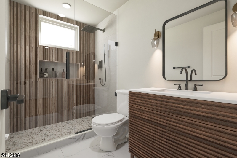 755 River Road Chatham, NJ 07928 - Photo 24 of 34 a bathroom with a sink a toilet and shower