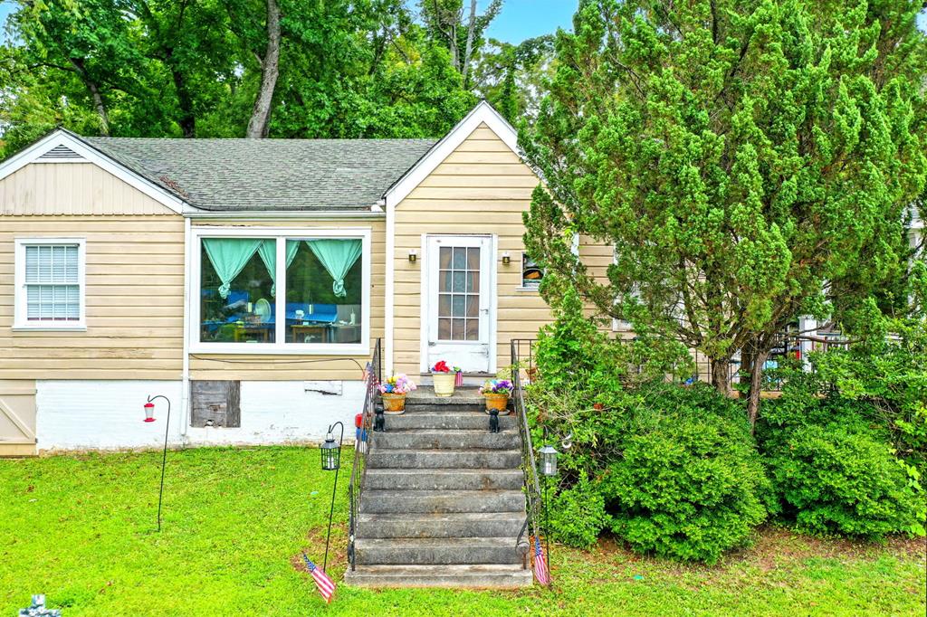 a house view with a garden space