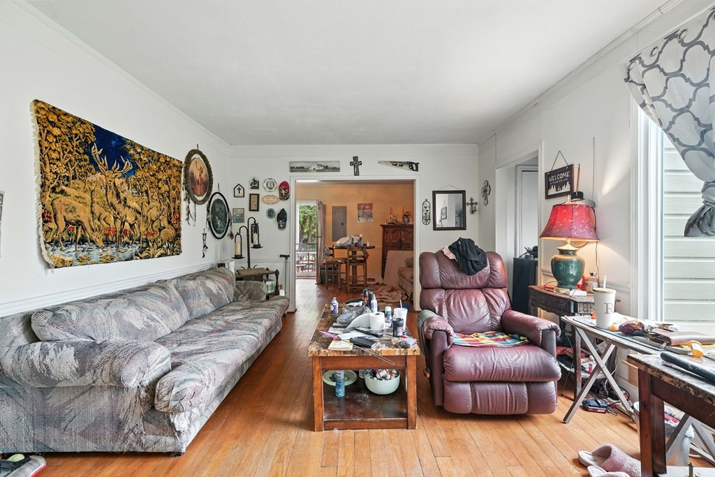 1003 East Church Street Jasper, GA 30143 - Photo 12 of 27 a living room with furniture and wooden floor