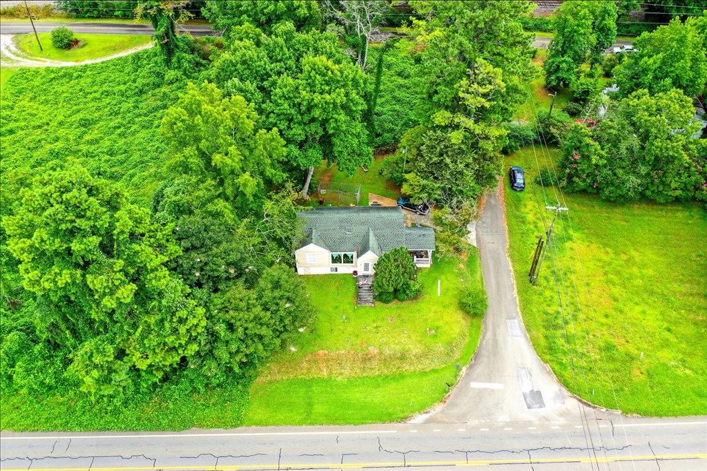 1003 East Church Street Jasper, GA 30143 - Photo 24 of 27 a view of a swimming pool with a patio and yard