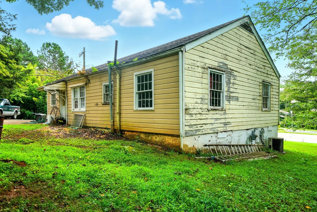 1003 East Church Street Jasper, GA 30143 - Photo 3 of 27 a view of a house with a yard