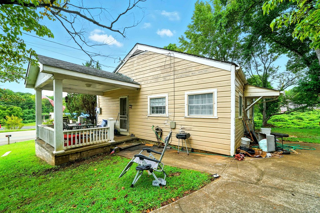 1003 East Church Street Jasper, GA 30143 - Photo 5 of 27 a view of a house with a backyard