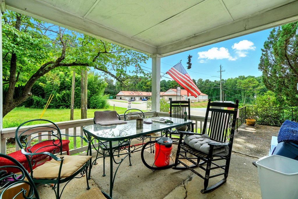 1003 East Church Street Jasper, GA 30143 - Photo 7 of 27 a patio with yard table and chairs