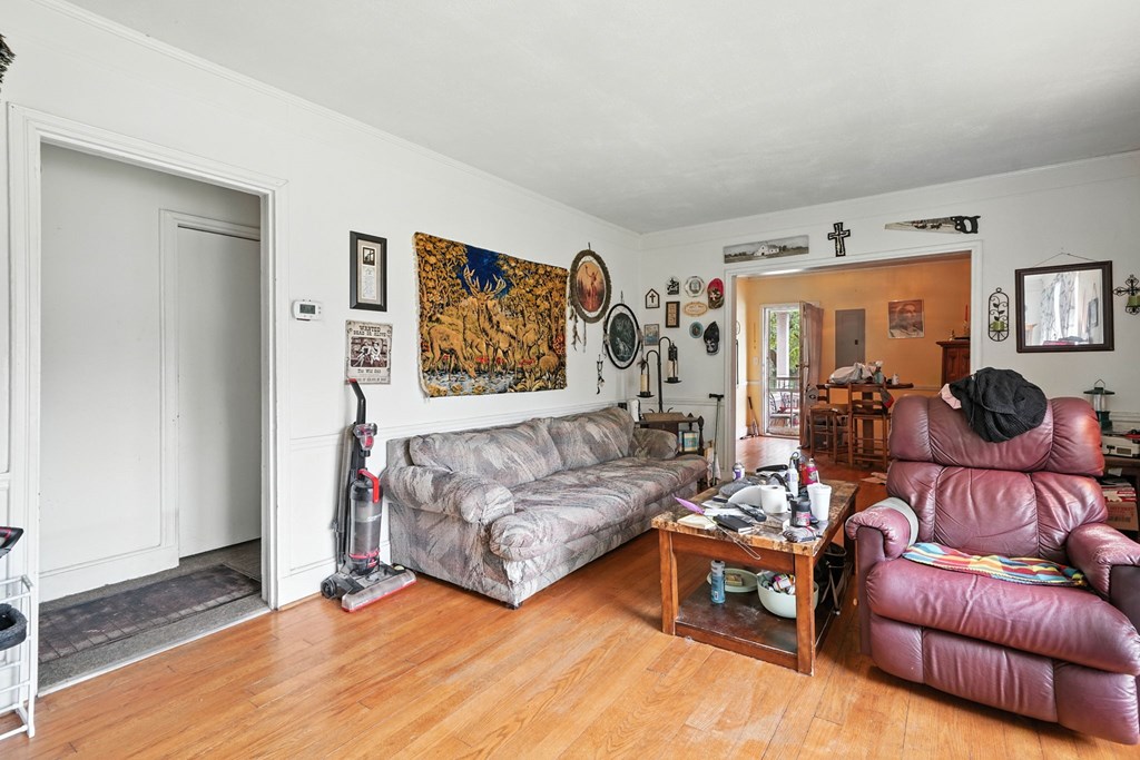 1003 East Church Street Jasper, GA 30143 - Photo 10 of 27 a living room with furniture and a flat screen tv