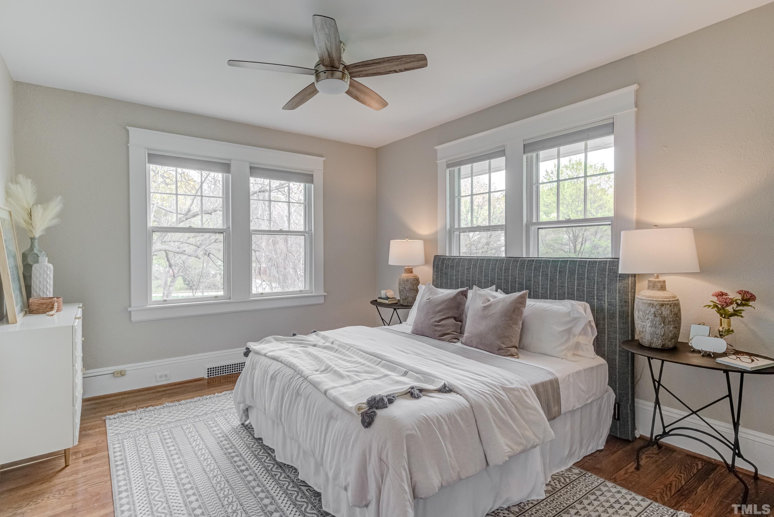 402 Cole Street Raleigh, NC 27605 - Photo 16 of 39 a bedroom with a bed and a window