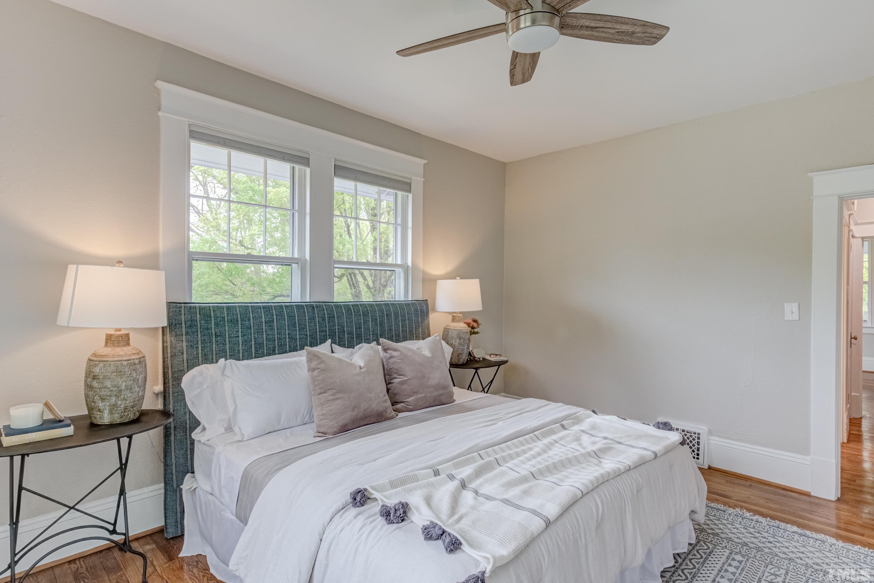 402 Cole Street Raleigh, NC 27605 - Photo 18 of 39 a bedroom with a bed and window