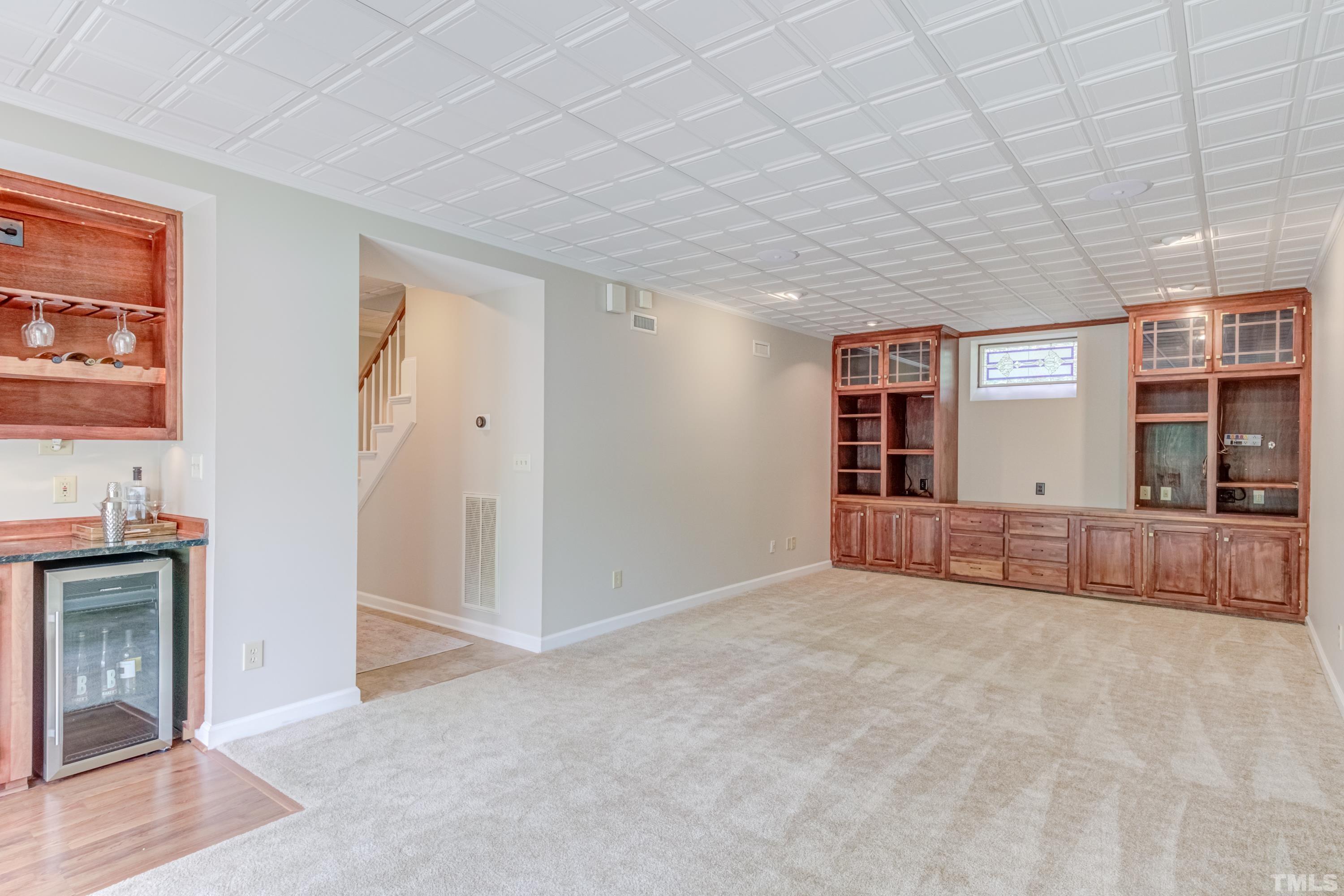 402 Cole Street Raleigh, NC 27605 - Photo 26 of 39 an empty room with entrance and windows