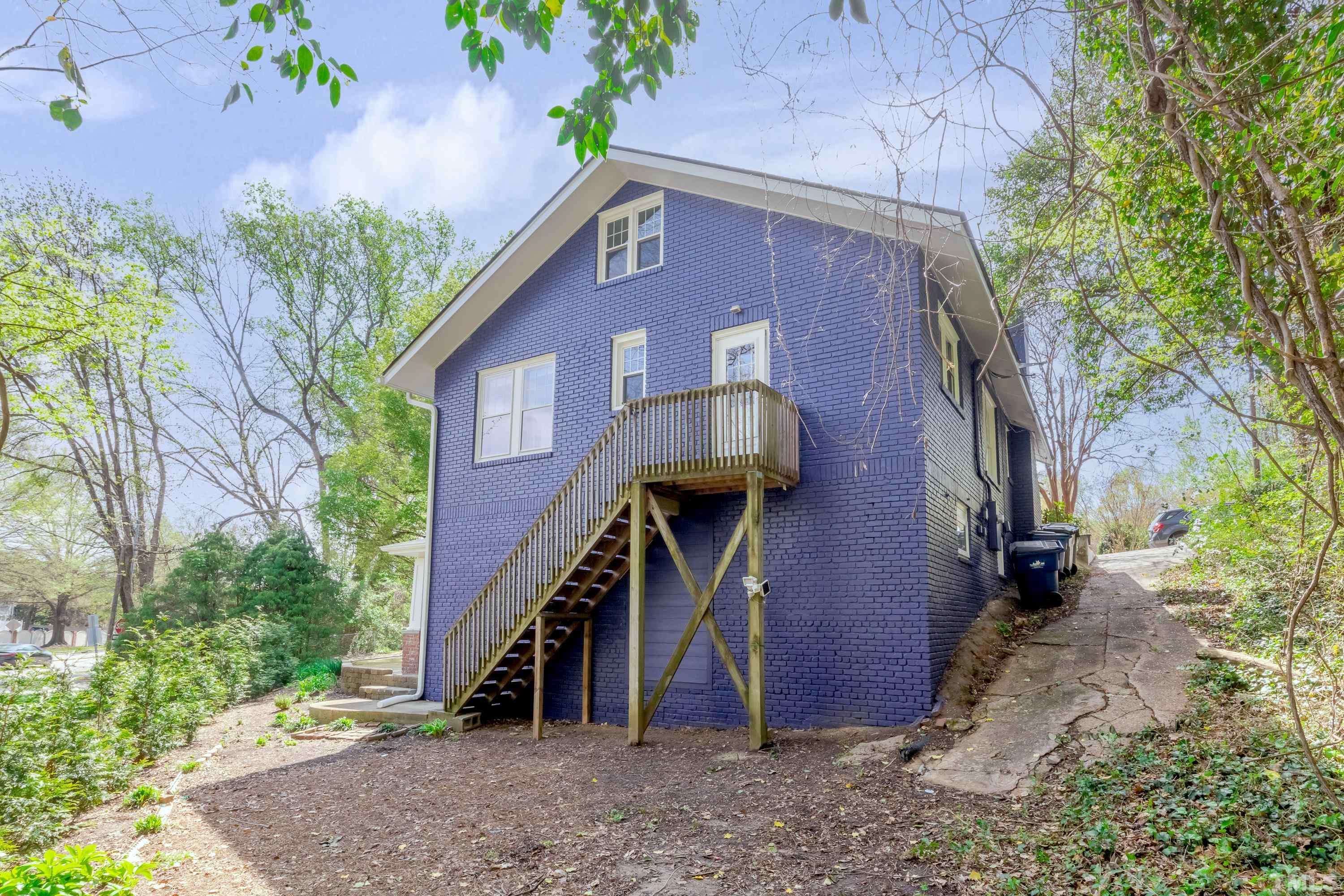 402 Cole Street Raleigh, NC 27605 - Photo 34 of 39 a view of a house with a yard