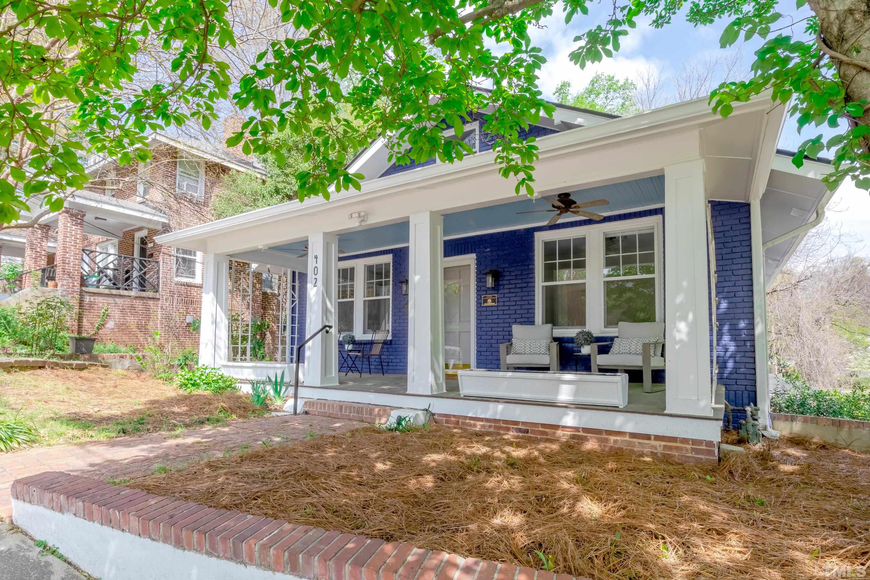 402 Cole Street Raleigh, NC 27605 - Photo 38 of 39 a house with a sitting space and garden space