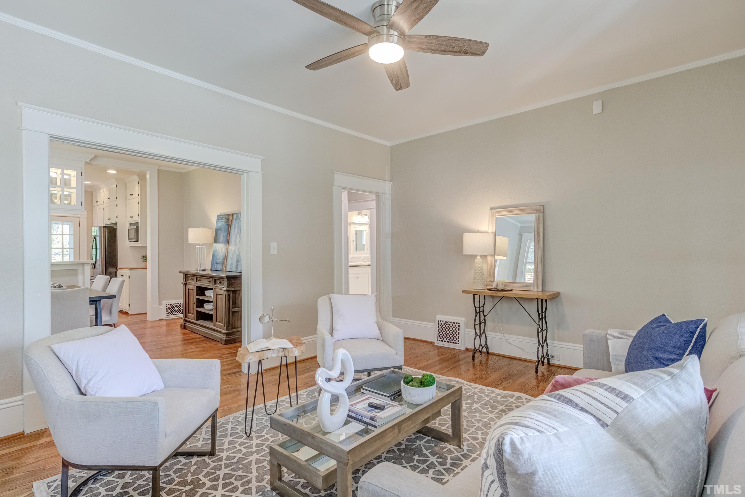 402 Cole Street Raleigh, NC 27605 - Photo 7 of 39 a living room with furniture and a table