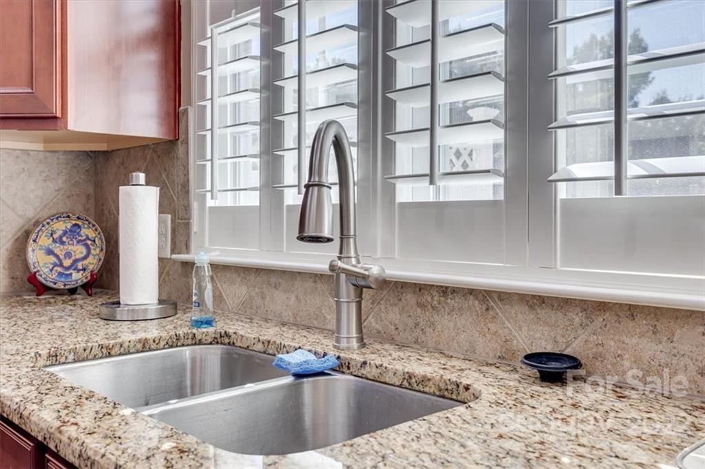 1112 Drayton Court Fort Mill, SC 29708 - Photo 14 of 27 a kitchen with a sink and a window