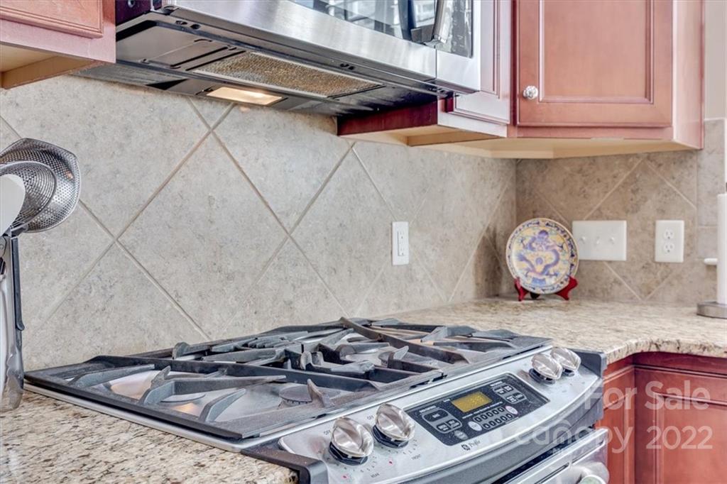 1112 Drayton Court Fort Mill, SC 29708 - Photo 15 of 27 a stove top oven sitting inside of a kitchen