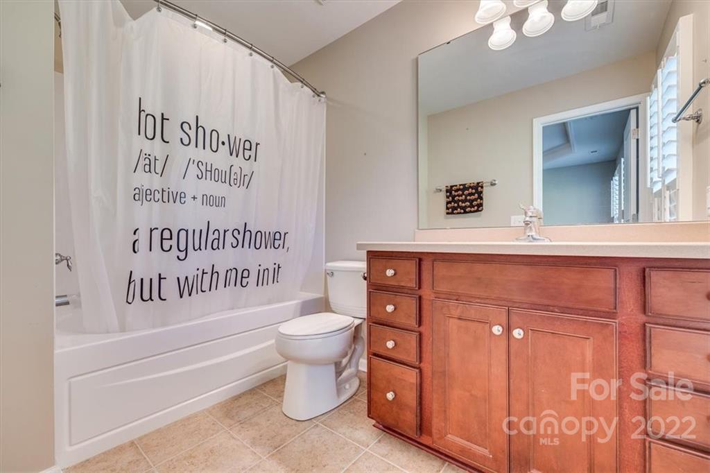 1112 Drayton Court Fort Mill, SC 29708 - Photo 23 of 27 a bathroom with a toilet a sink and a bathtub