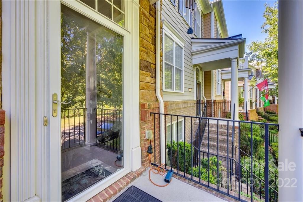 1112 Drayton Court Fort Mill, SC 29708 - Photo 4 of 27 a view of a balcony with a potted plant