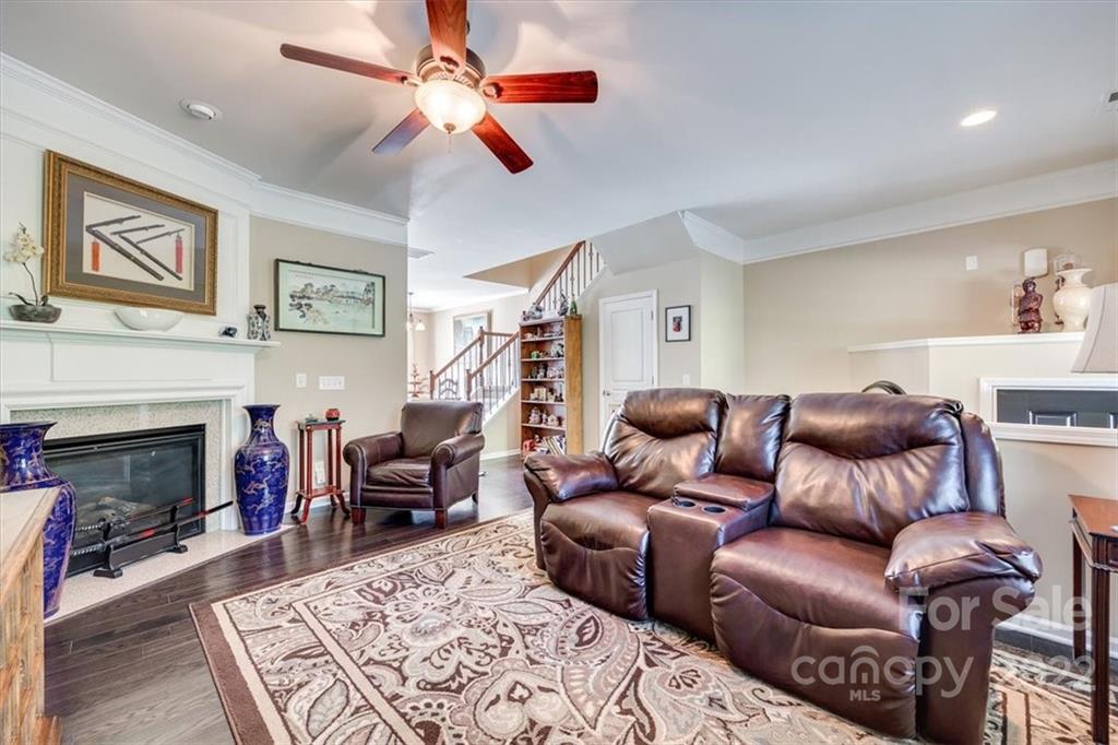 1112 Drayton Court Fort Mill, SC 29708 - Photo 8 of 27 a living room with furniture and a fireplace