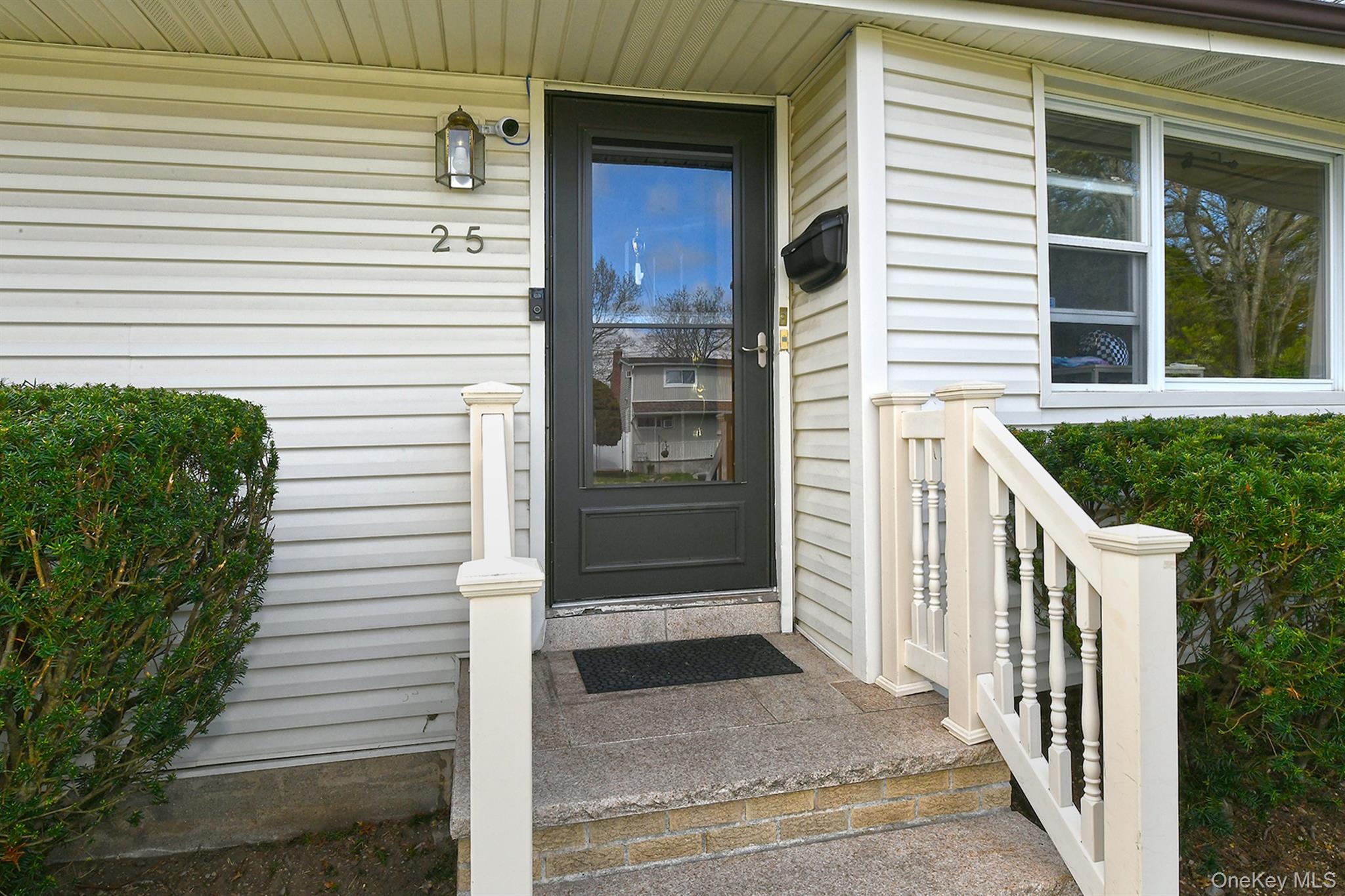 25 Lincoln Road North Plainview, NY 11803 - Photo 2 of 13 a view of front door of house