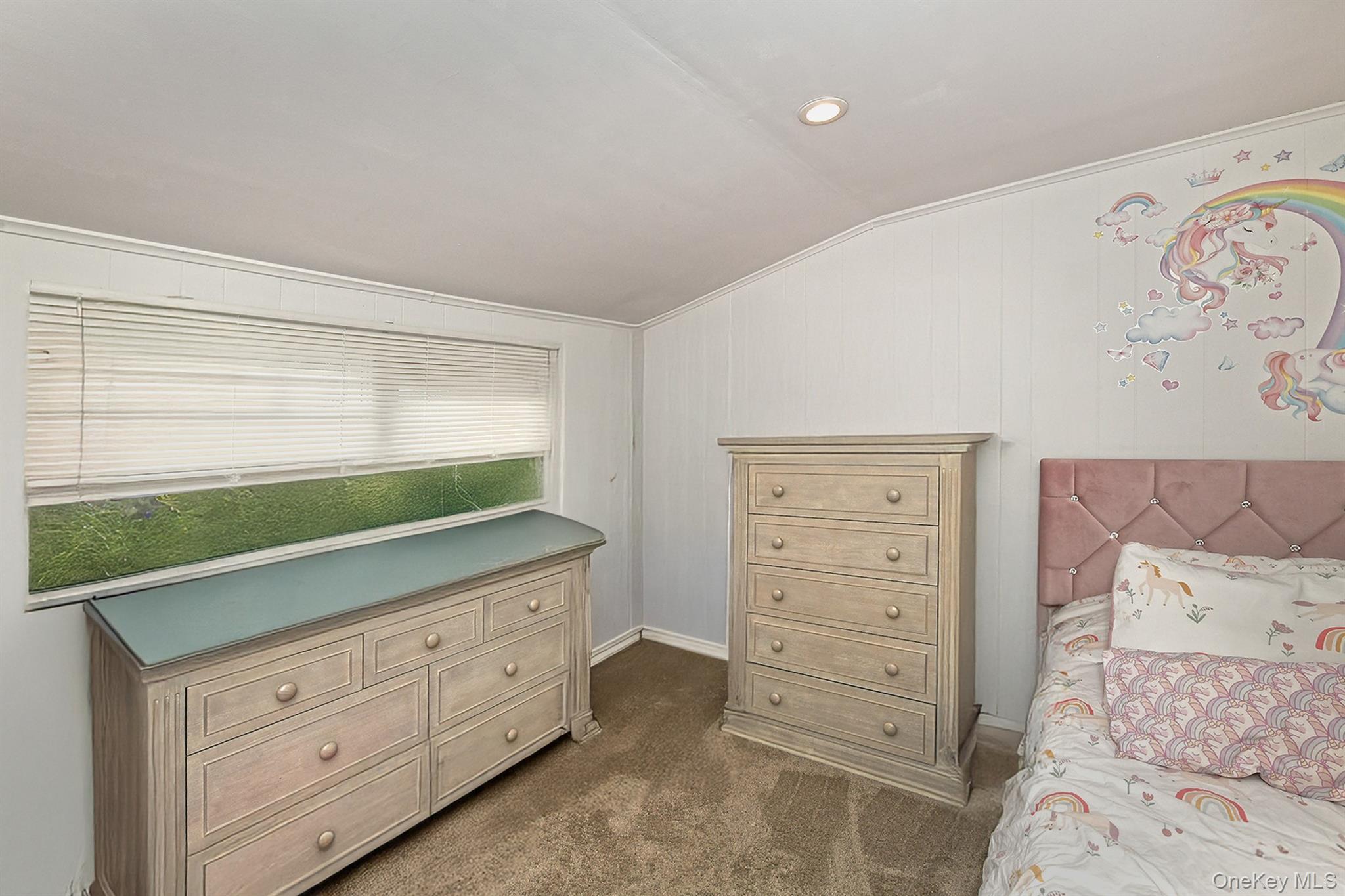25 Lincoln Road North Plainview, NY 11803 - Photo 9 of 13 a bedroom with a bed and a dresser in it