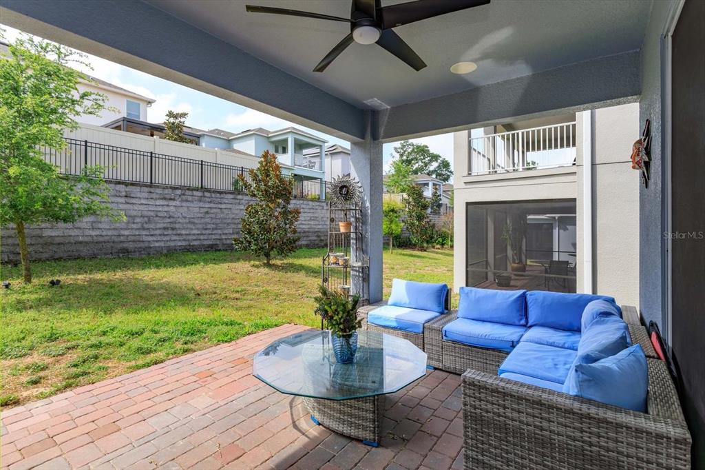 1231 Foltz Loop Oakland, FL 34787 - Photo 27 of 30 a view of a patio filled with furniture