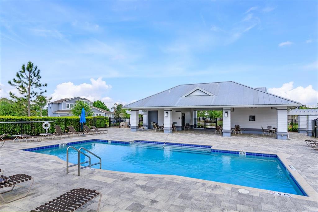 1231 Foltz Loop Oakland, FL 34787 - Photo 29 of 30 a swimming pool with outdoor seating yard and barbeque oven
