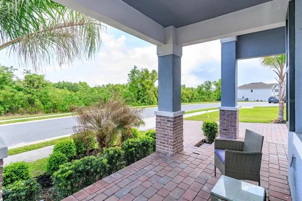a view of swimming pool with a patio