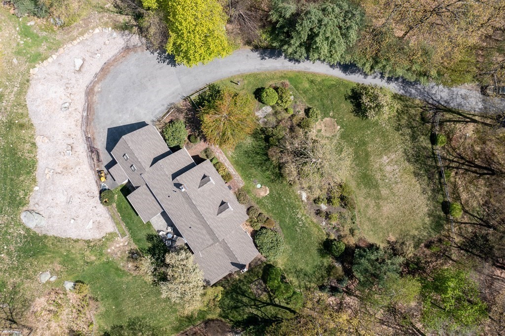 235 Mirick Road Princeton, MA 01541 - Photo 2 of 42 an aerial view of a house with a yard and trees