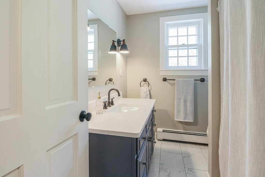 235 Mirick Road Princeton, MA 01541 - Photo 34 of 42 a bathroom with a sink and a mirror
