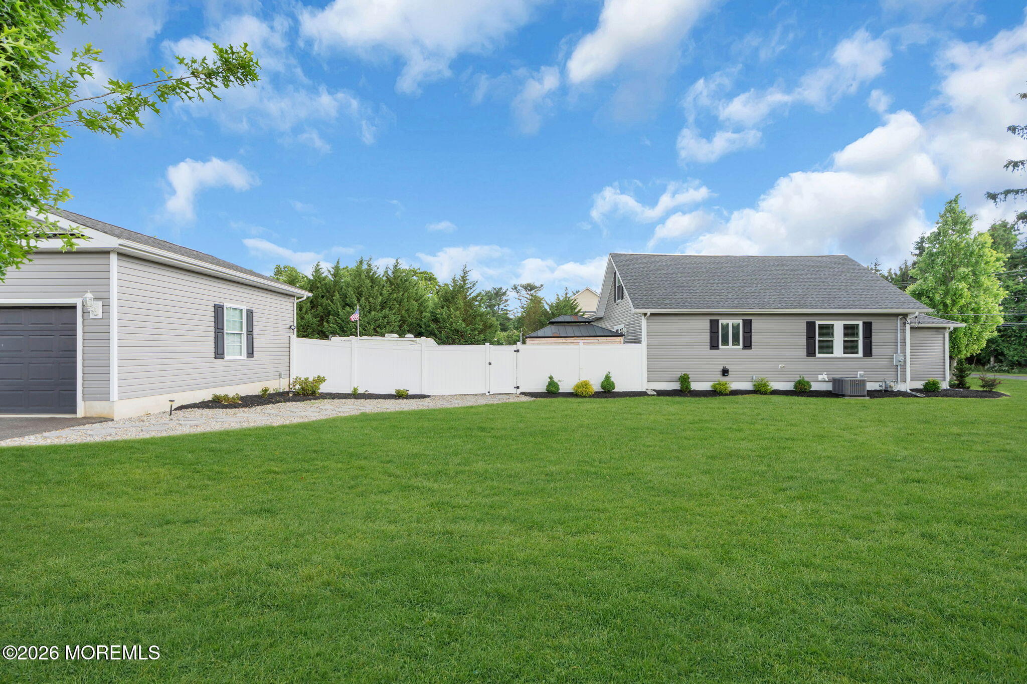 181 Locust Avenue Howell, NJ 07731 - Photo 57 of 66 a front view of house with yard and green space