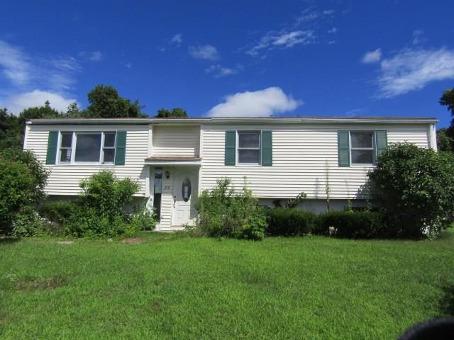28 Quarry Hill Road Waterbury, CT 06706 - Photo 1 of 1 a front view of a house with a yard