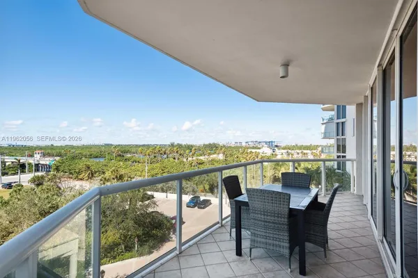 a view of a balcony with an ocean view