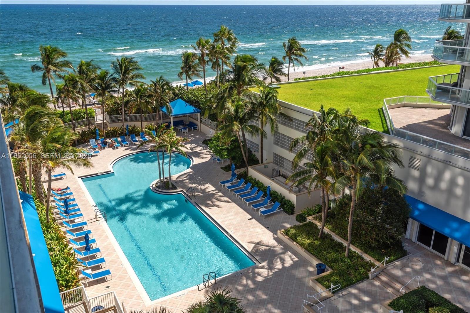 Hollywood Hollywood, FL 33019 - Photo 21 of 31 a view of a swimming pool with a patio