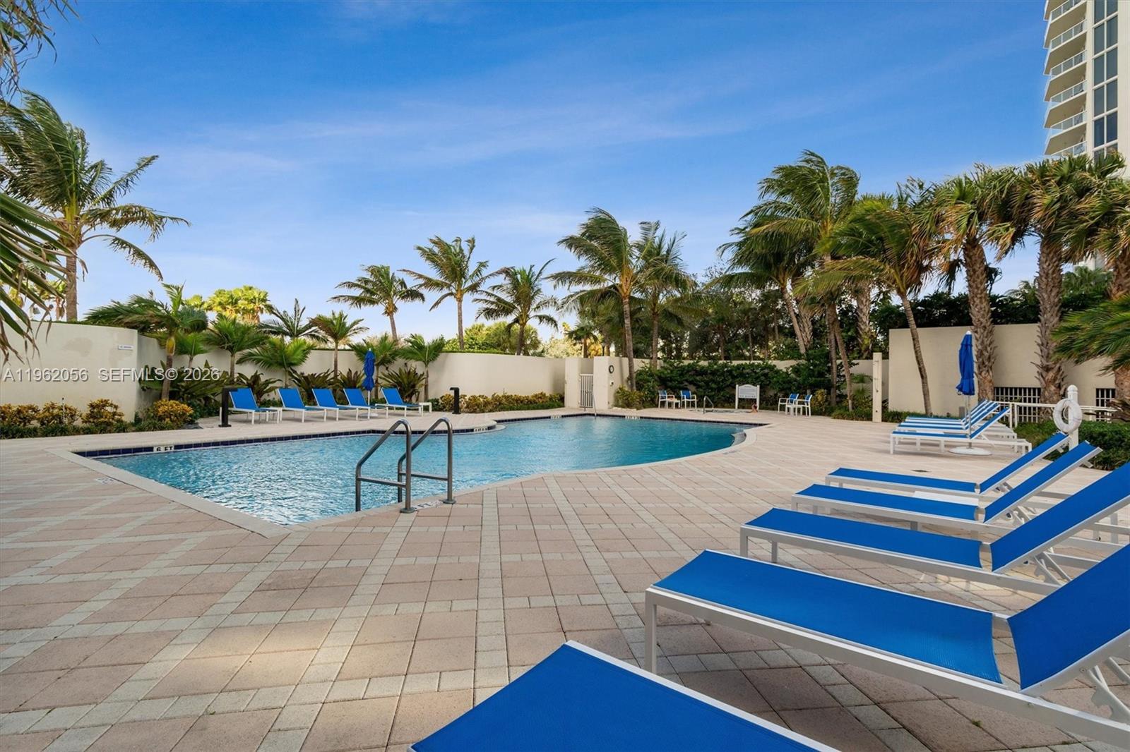 Hollywood Hollywood, FL 33019 - Photo 30 of 31 a swimming pool with yard in front of it