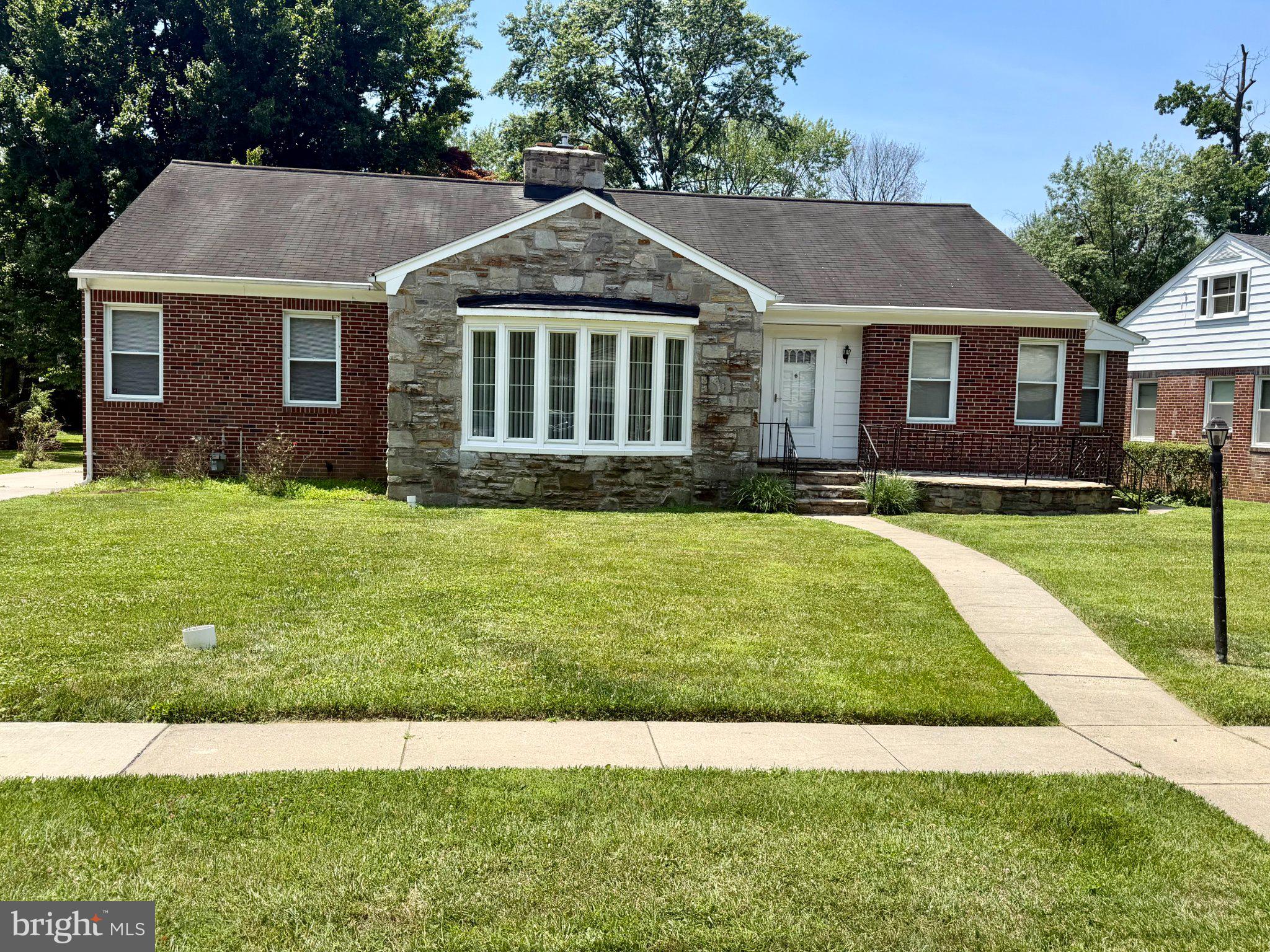 6318 Winner Avenue Baltimore, MD 21215 - Photo 2 of 75 Charming brick home with stone accents.