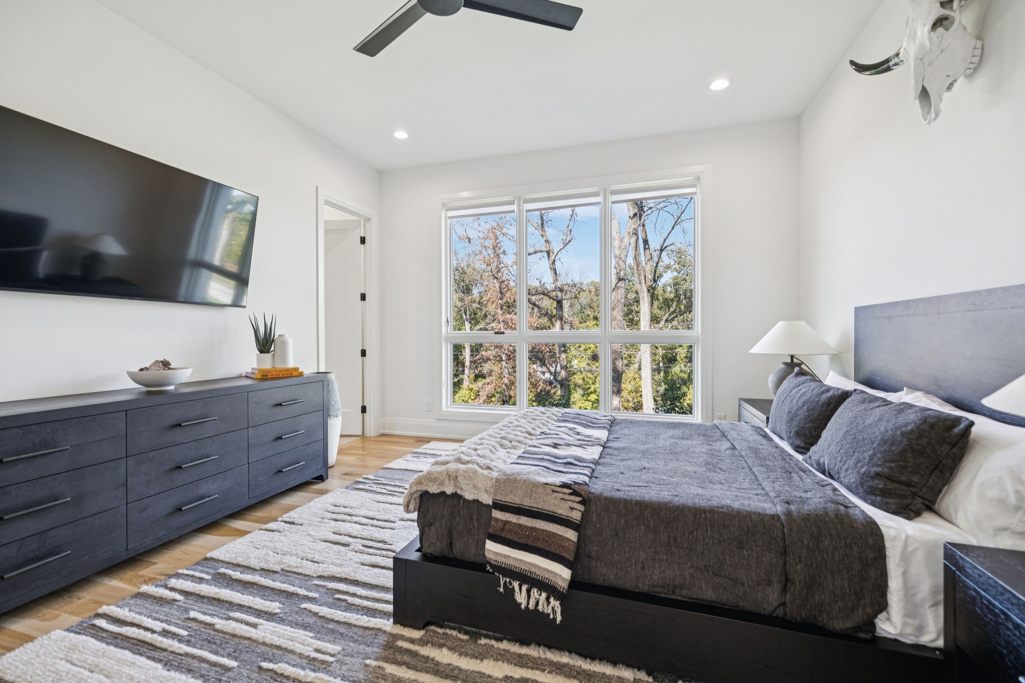 1323 Harding Place Nashville, TN 37215 - Photo 43 of 95 a bed room with a bed and a television