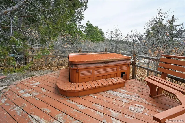 a backyard of a house with barbeque oven