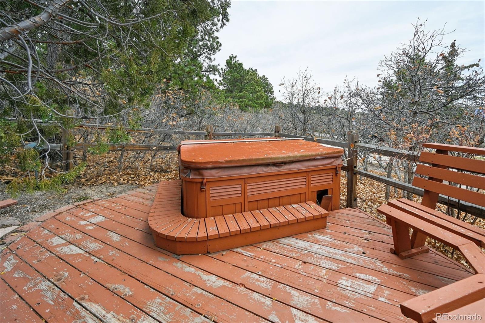 17580 Chipped Arrow Way Monument, CO 80132 - Photo 11 of 47 a backyard of a house with barbeque oven