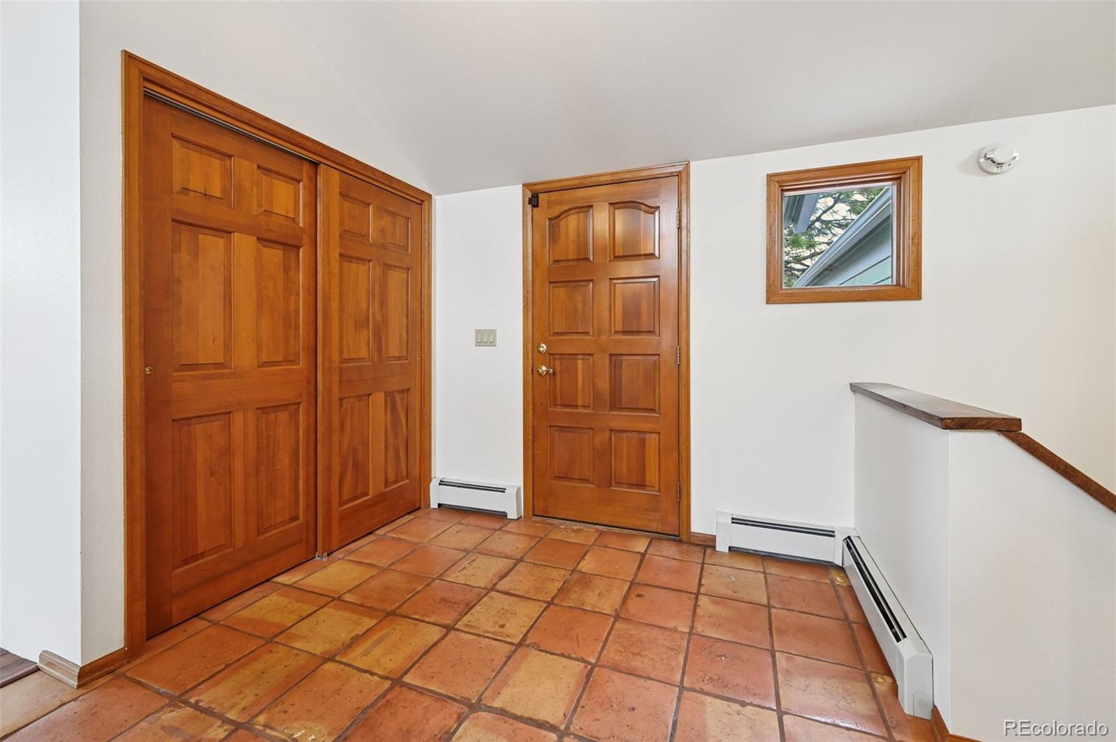 17580 Chipped Arrow Way Monument, CO 80132 - Photo 12 of 47 a view of an entryway with a door