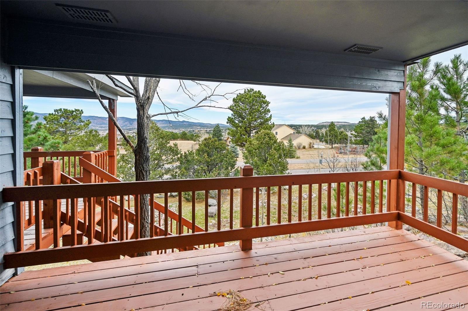 17580 Chipped Arrow Way Monument, CO 80132 - Photo 8 of 47 a view of balcony with wooden floor
