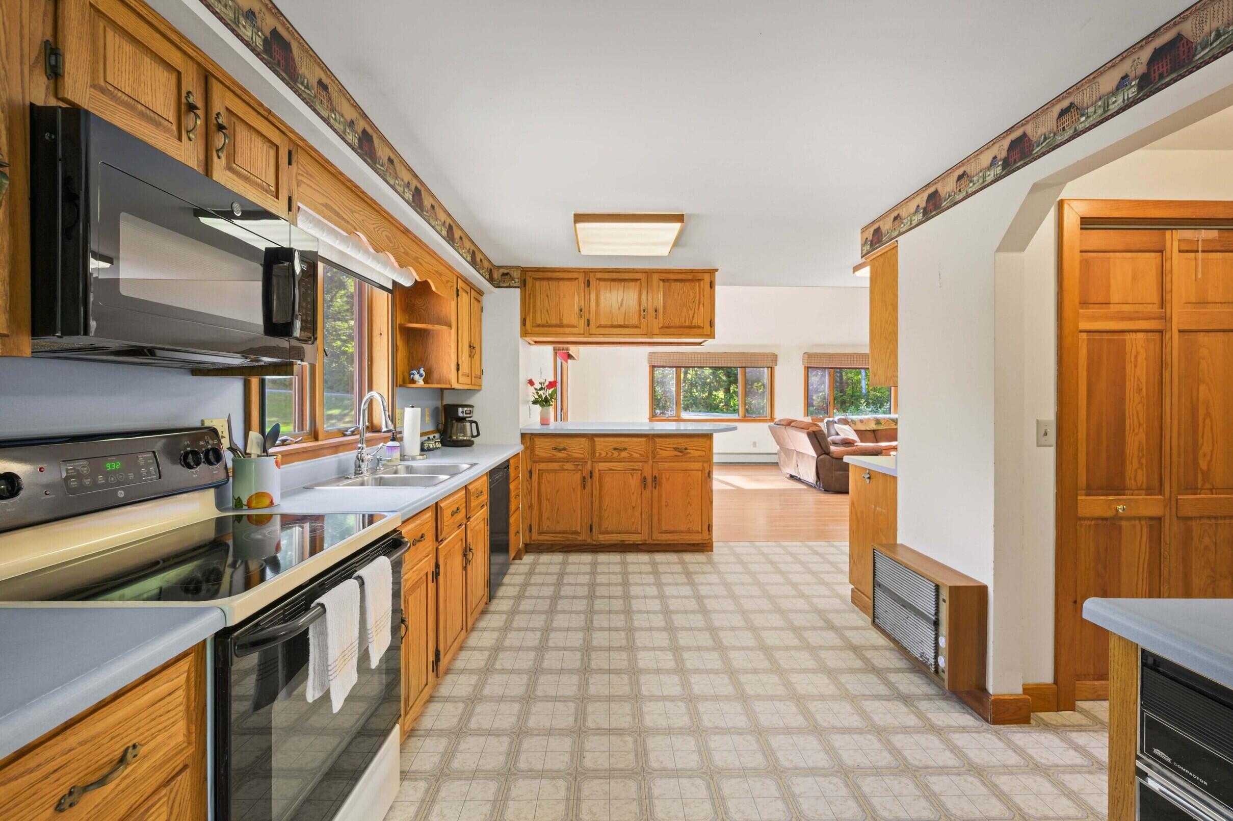 196 Case Road Winthrop, ME 04364 - Photo 6 of 65 Kitchen into open living