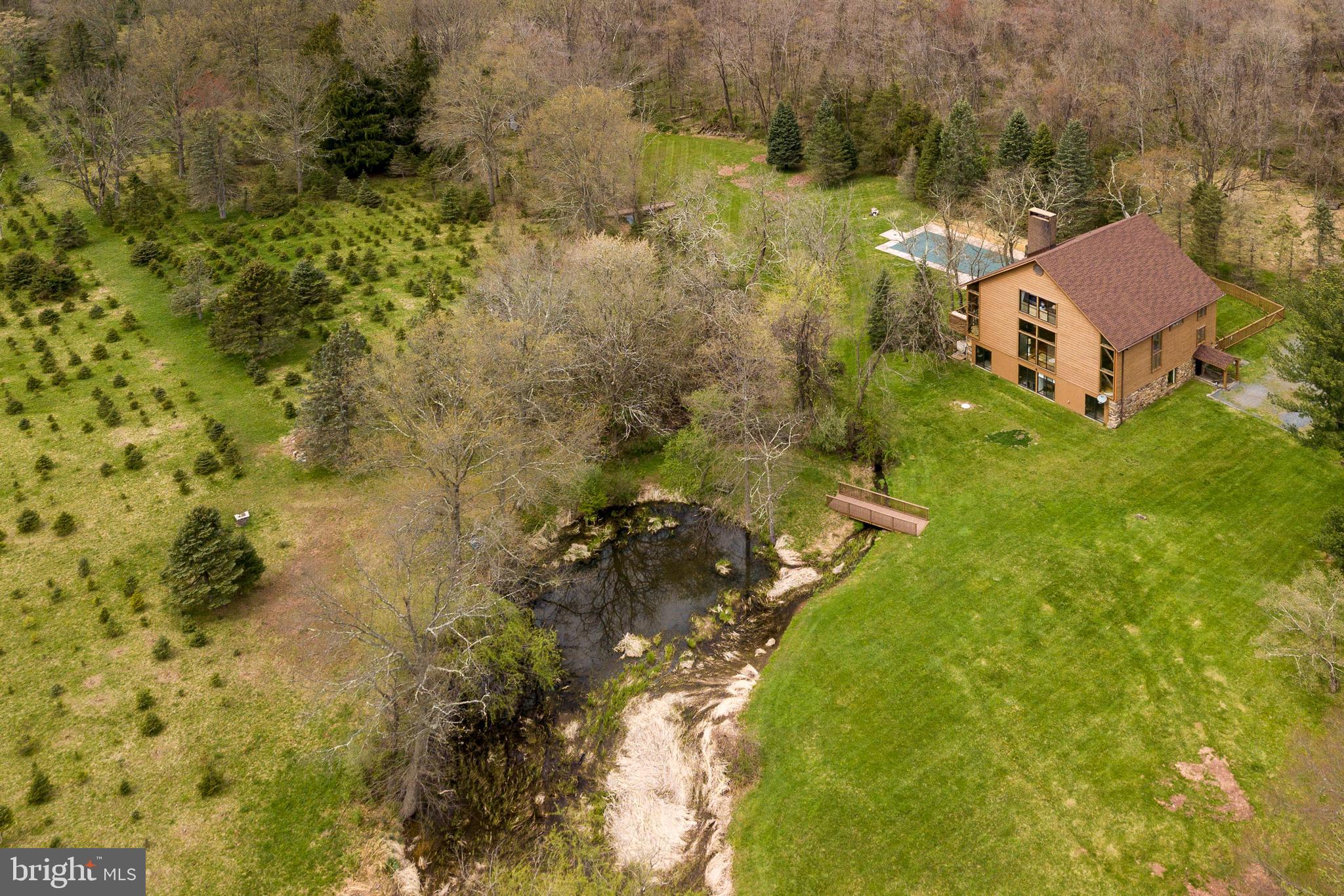 900 Canal Road Princeton, NJ 08540 - Photo 1 of 38 a aerial view of a house with a yard and lake view