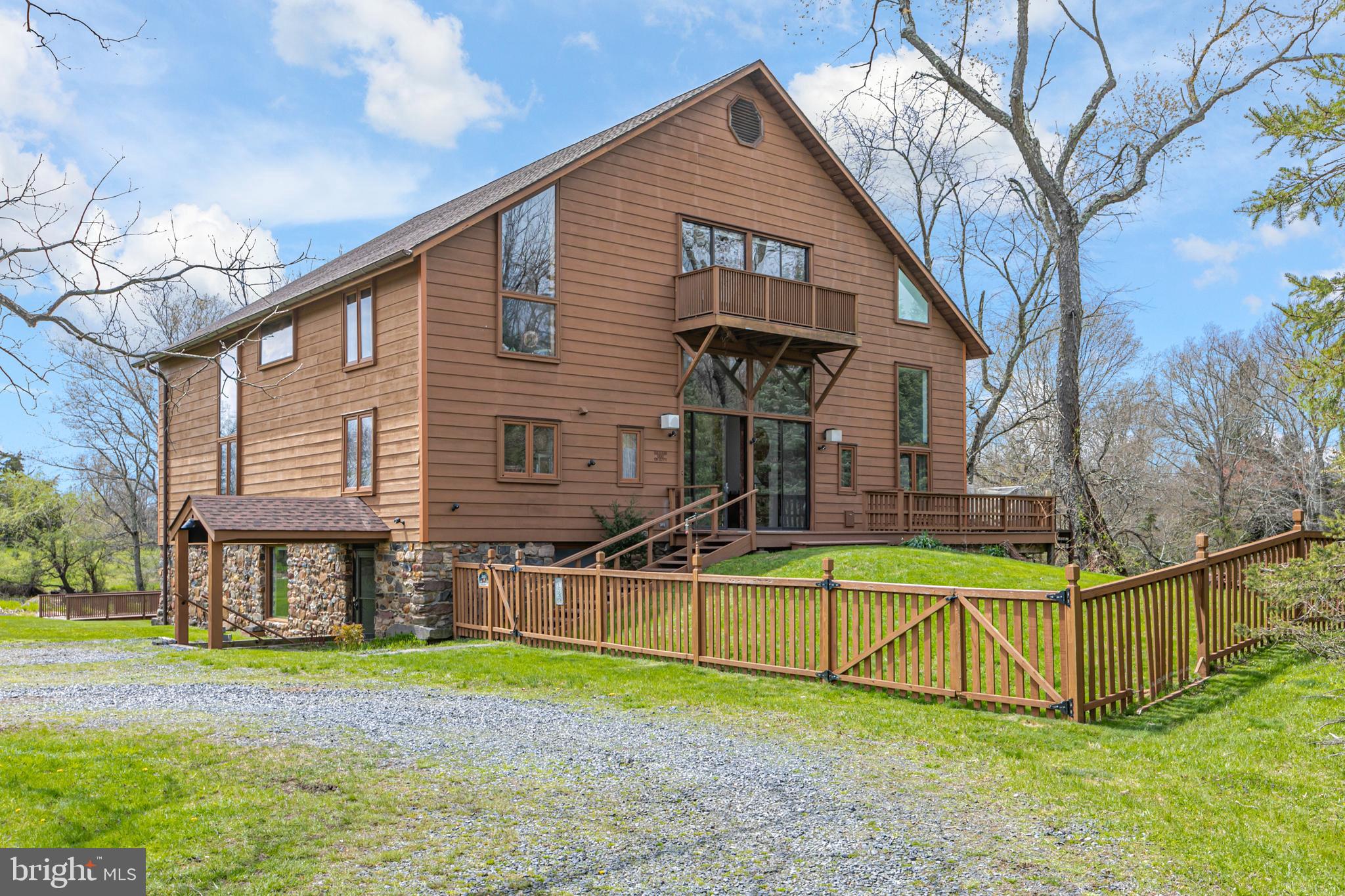 900 Canal Road Princeton, NJ 08540 - Photo 2 of 38 a view of a house with a yard and sitting area