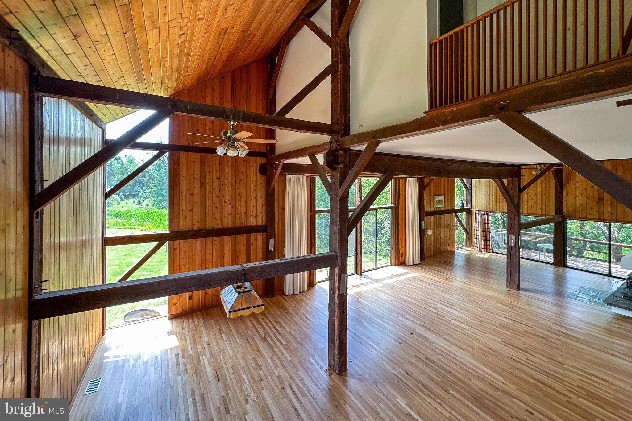 900 Canal Road Princeton, NJ 08540 - Photo 21 of 38 a view of porch with furniture and wooden floor