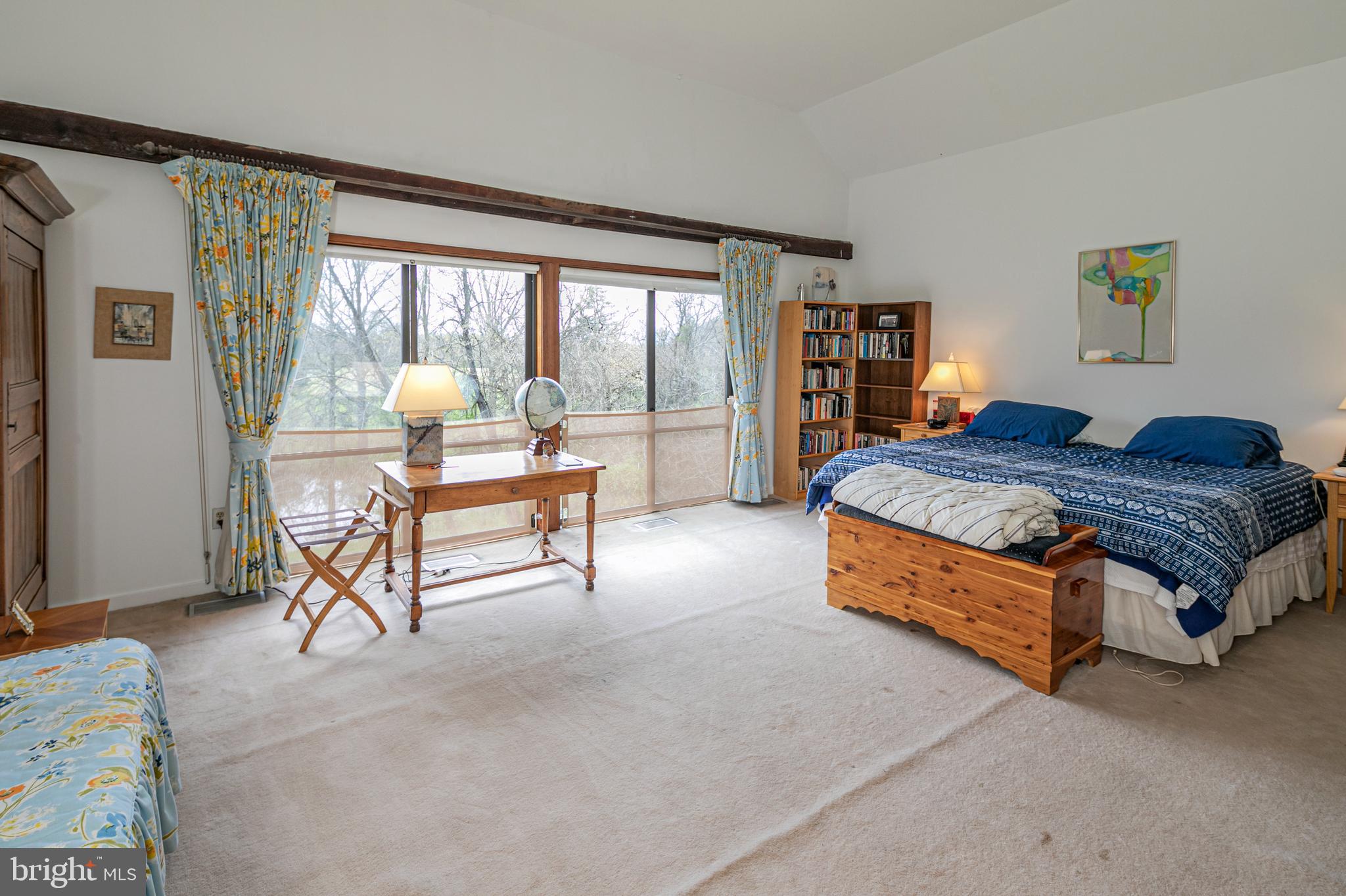 900 Canal Road Princeton, NJ 08540 - Photo 25 of 38 a living room with a bed furniture and a large window