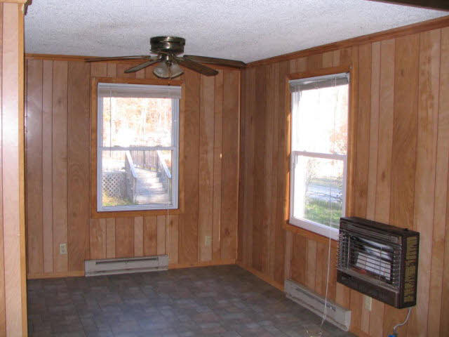 8520 Briery Branch Road Dayton, VA 22821 - Photo 5 of 11 a view of an empty room and window ceiling fan