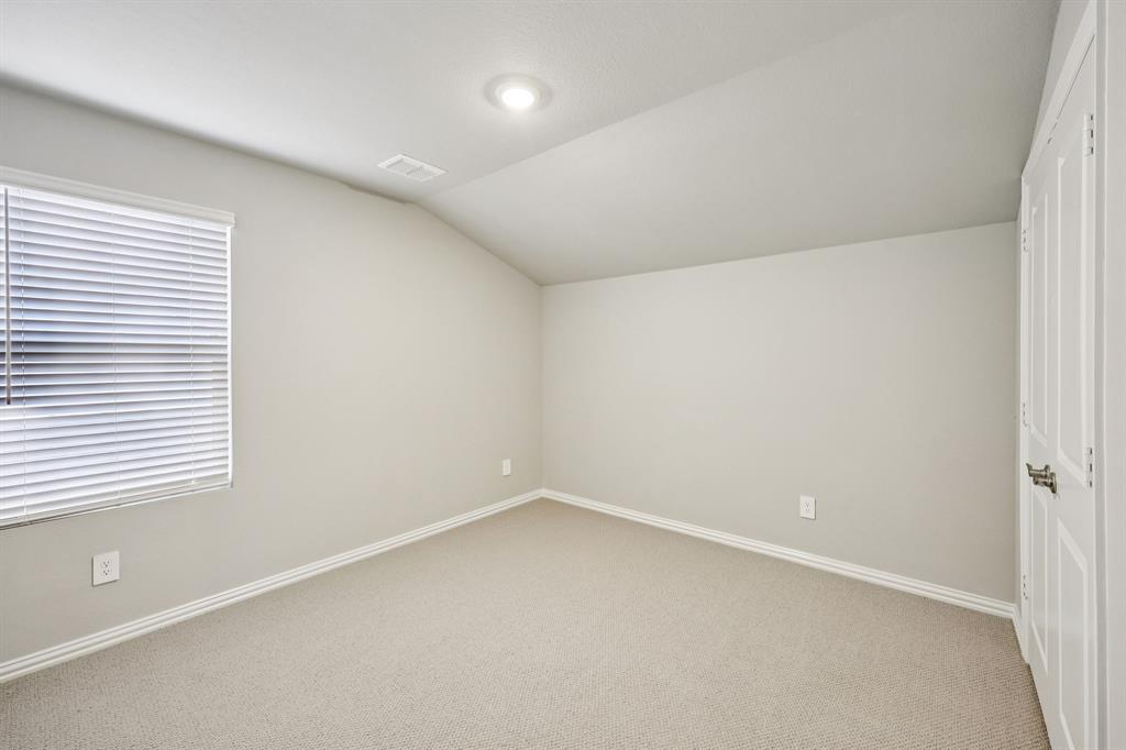 1721 Arches Road Anna, TX 75409 - Photo 30 of 39 an empty room with a window