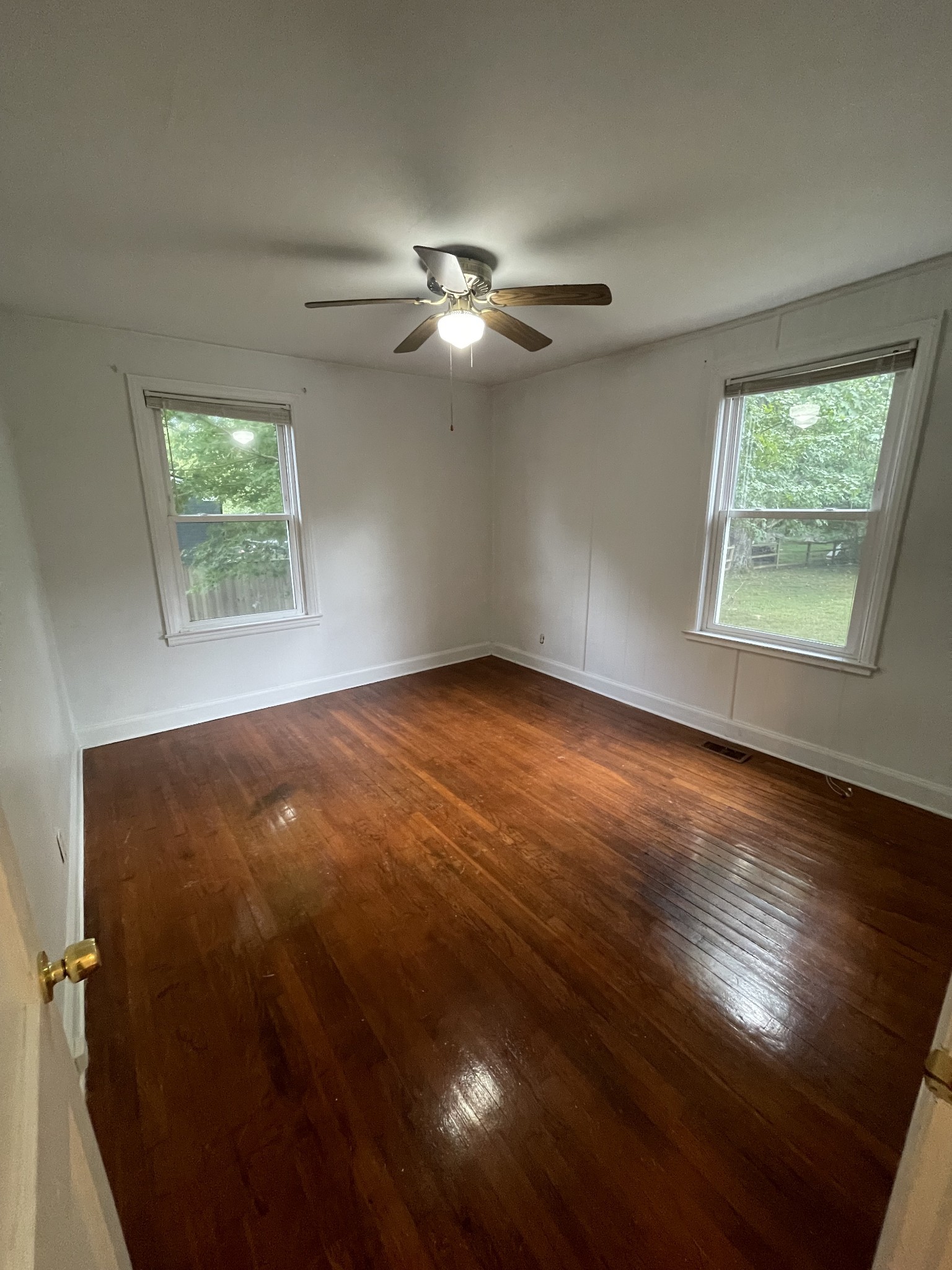 3452 Mt Tabor Road Murfreesboro, TN 37127 - Photo 4 of 5 a view of empty room with wooden floor and fan