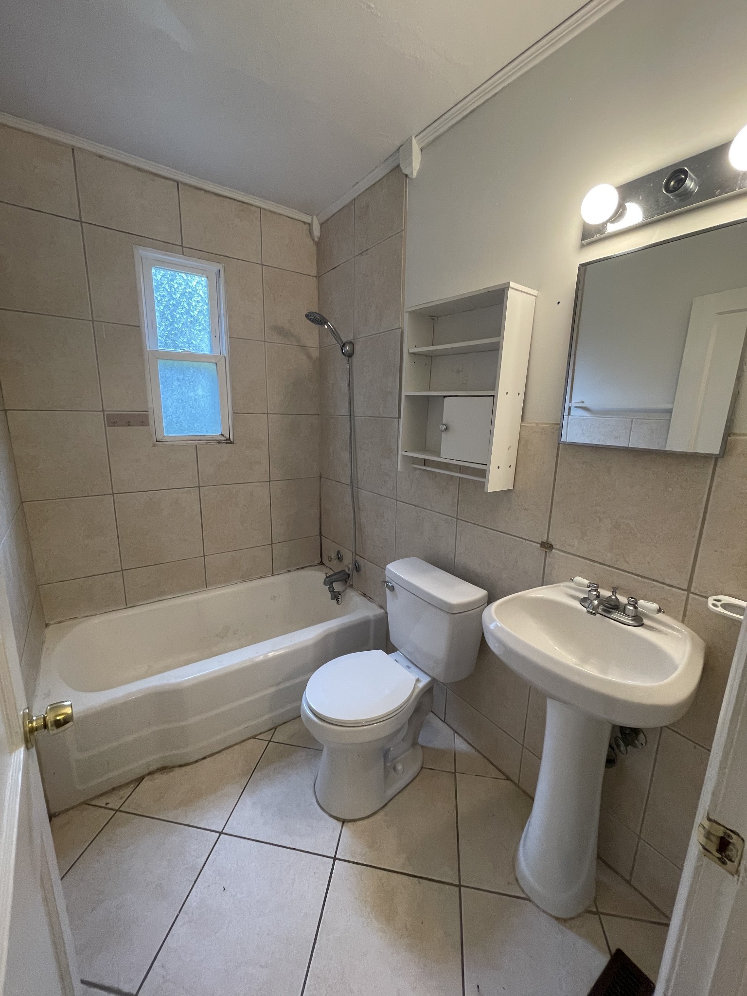 3452 Mt Tabor Road Murfreesboro, TN 37127 - Photo 5 of 5 a bathroom with a sink toilet a mirror and bathtub
