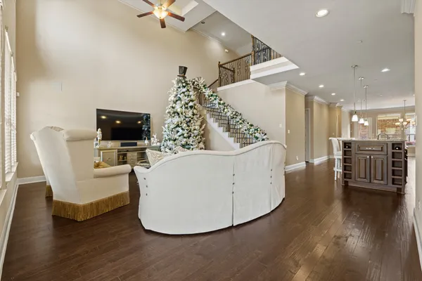 a view of a livingroom with furniture and a workspace