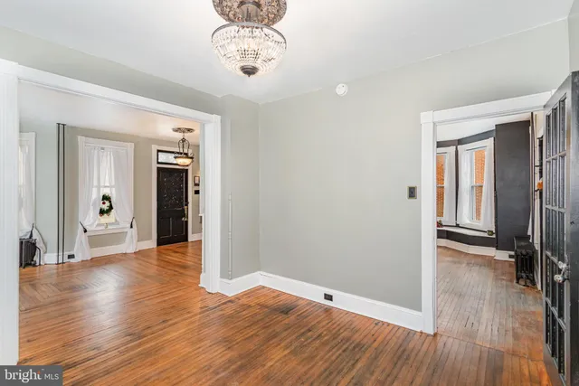 a kitchen with granite countertop cabinets stainless steel appliances and a counter space